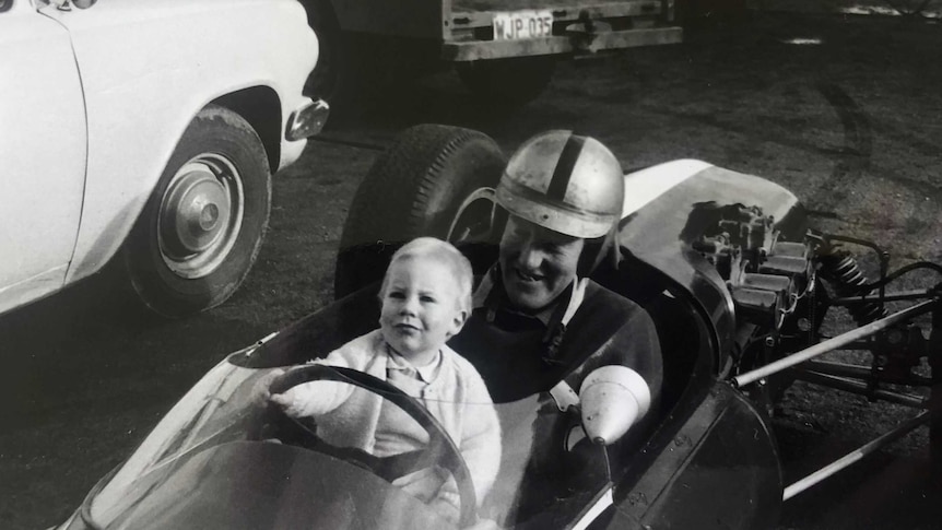 John Youl with son Andrew in a racing car.