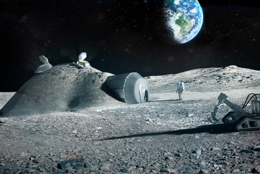 Concept art showing a human constructed dome with an entrance covered in lunar soil.