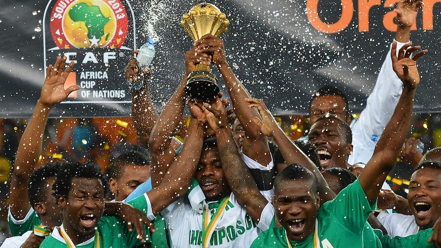 Nigeria's players celebrate with the trophy after winning the 2013 African Cup of Nations.