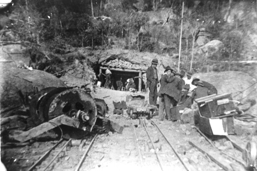 Men gather near the entrance to the Mount Mulligan coal mine after the 1921 explosion that killed 75 workers.
