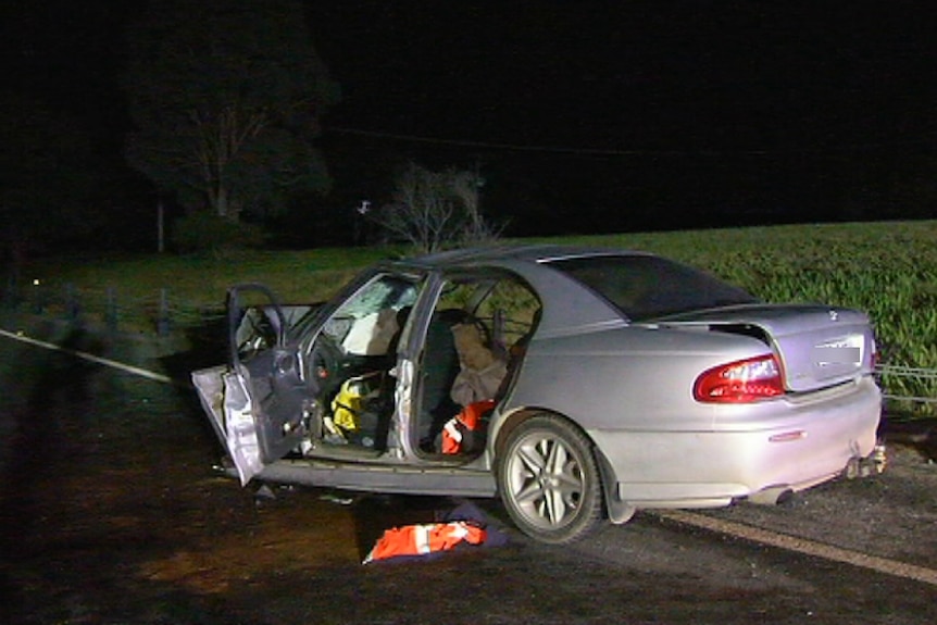 The wreckage of a silver commodore involved in a fatal car crash at Cranbourne East.