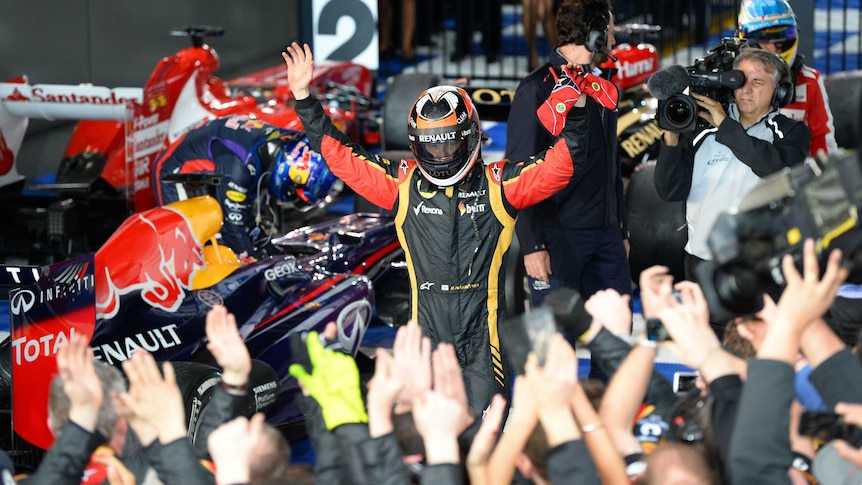 Albert Park champ ... Lotus driver Kimi Raikkonen celebrates his win.