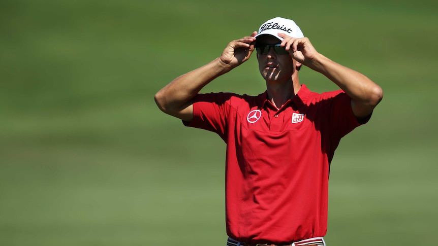 Solid showing ... Adam Scott looks on during round one in Florida