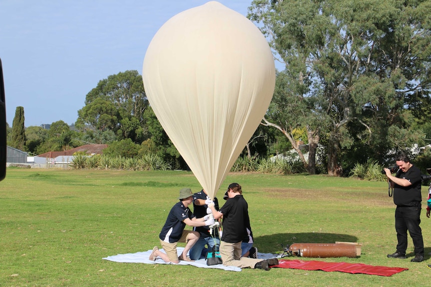 University students prepare to launch a balloon into 'near space', 36 kilometres into the stratosphere
