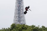 Franky Zapata on a flyboard in front of the Eiffel Tower.