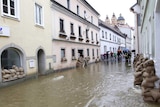 Sandbags line buildings in flooded Melk.