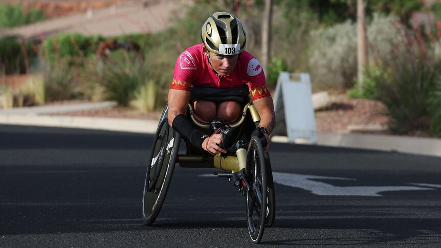 Lauren Parker competes on the handcycle during the 2021 ironman world championship.