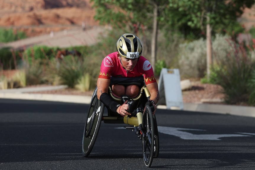 Lauren Parker competes on the handcycle during the 2021 ironman world championship.