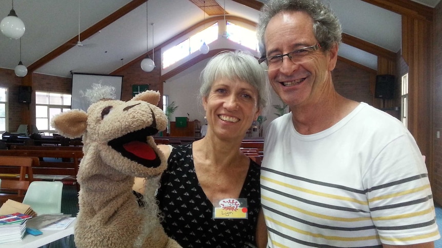 Lyn and Ken Diefenbach in St Andrews Yeppoon with camel puppet