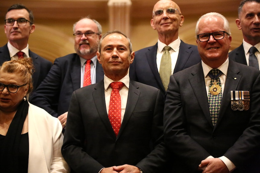 A group shot of new WA Premier Roger Cook standing with his cabinet colleagues