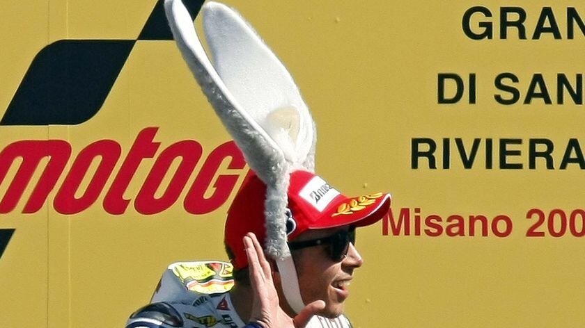 Yamaha MotoGP rider Valentino Rossi wears a large pair of rabbi after winning the Italian Grand Prix