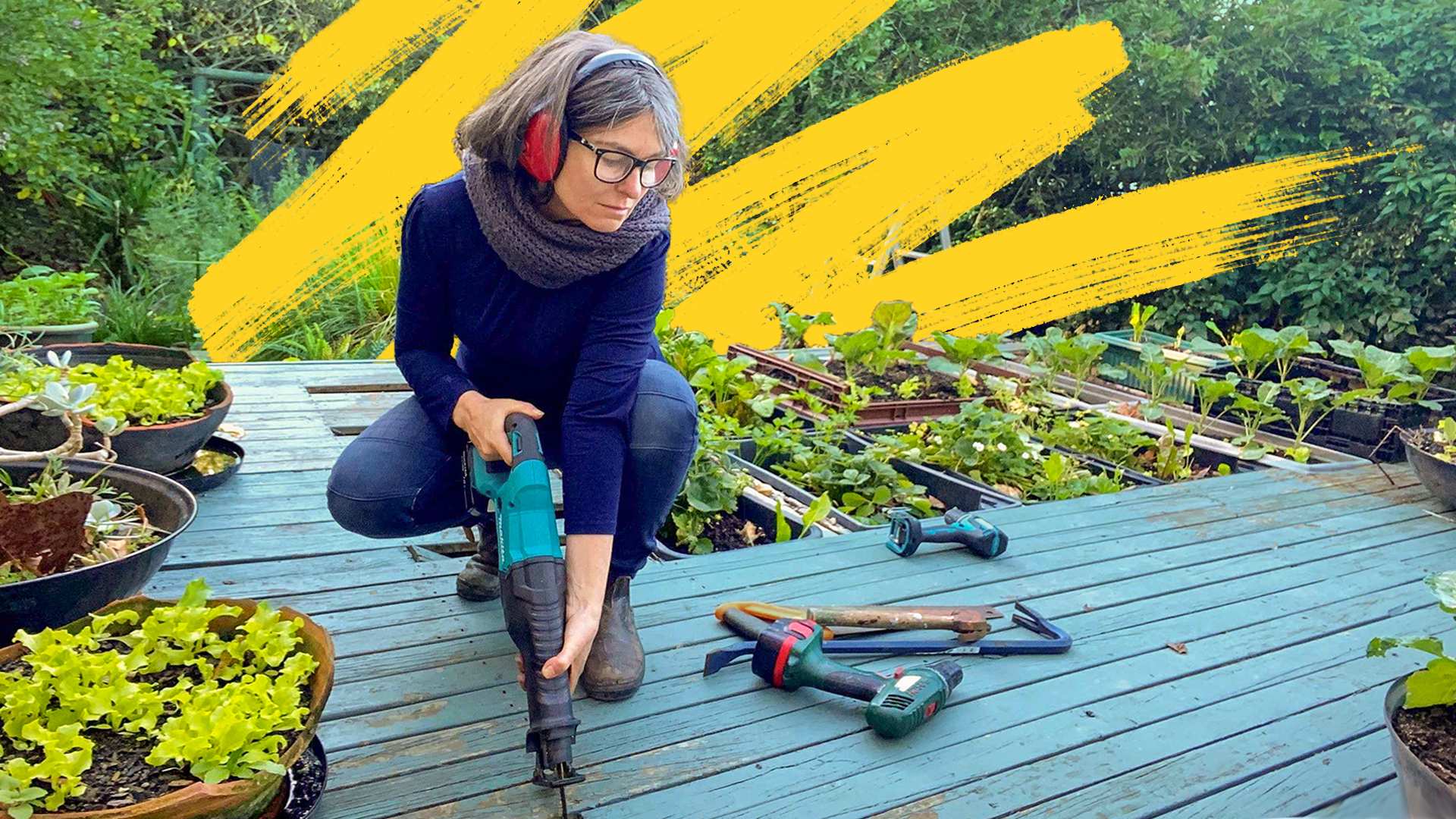 A woman uses an electric saw on a deck, for a story about frugal living tips.