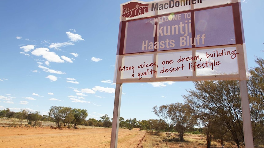 Sign at entrance road to Haasts Bluff community, NT.