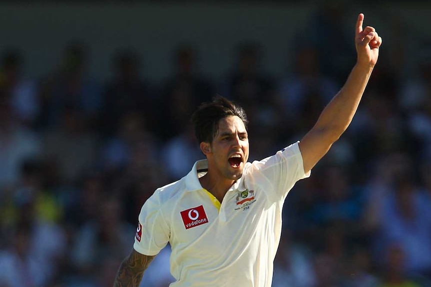 Johnson celebrates the wicket of du Plessis