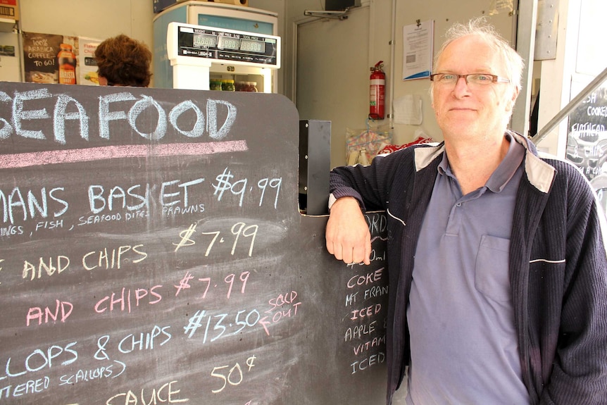 Brian Elliston in front of his fish and chip van at the Margate train.