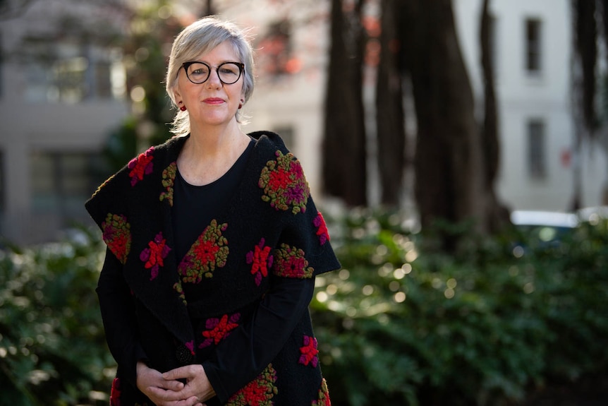 Achieve Australia chief executive Jo-Anne Hewitt pictured in a leafy park.