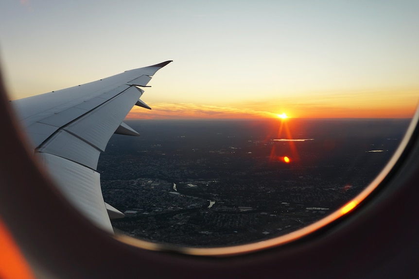 Sunset seen from a plane window. 
