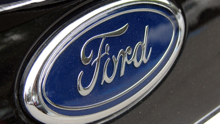 A Ford badge on a car.