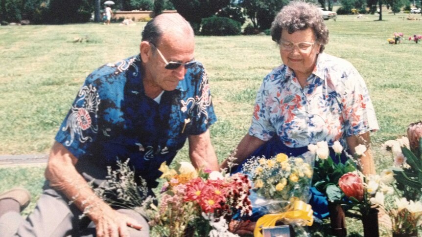Anita Cobby's parents at her grave site