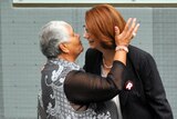 Gillard greets Donoghue in Parliament