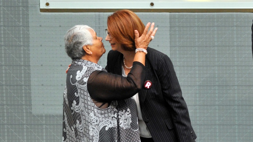 Gillard greets Donoghue in Parliament