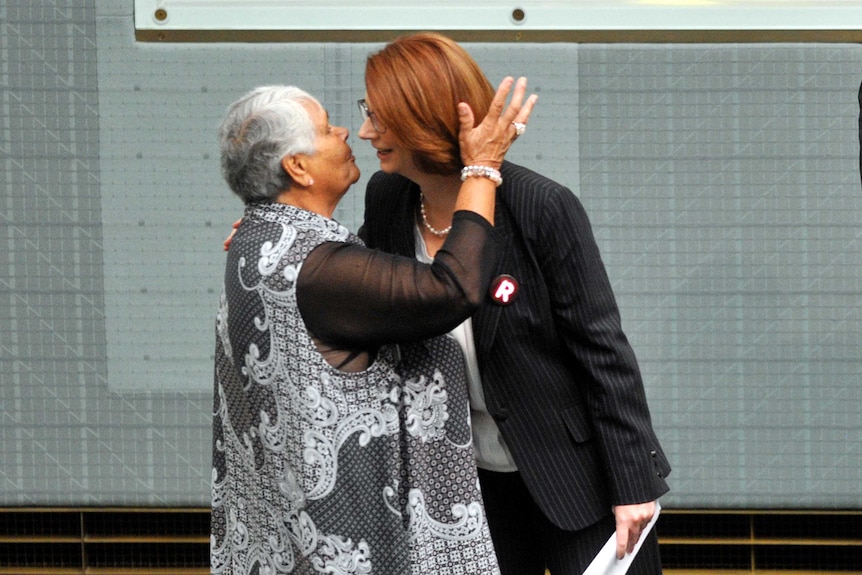 Gillard greets Donoghue in Parliament