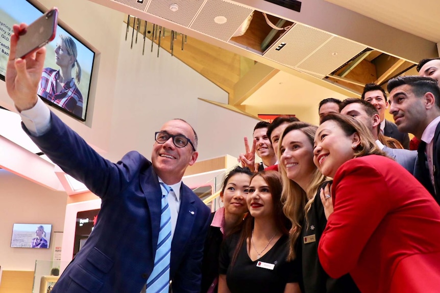 NAB CEO Andrew Thorburn takes a selfie with staff