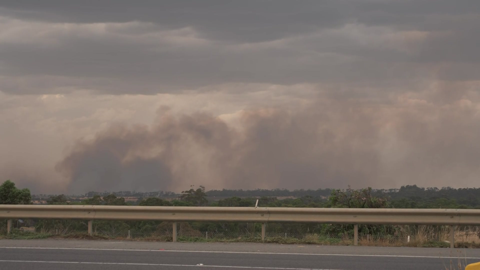Caravans damaged as a grassfire burned north of Melbourne