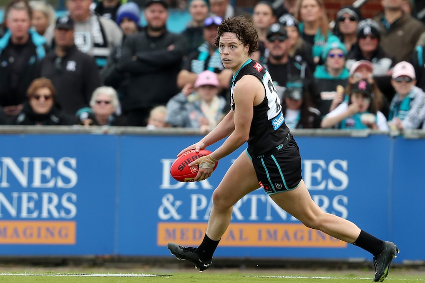 Ebony O'Dea of Port Adelaide looks to kick to a teammate during the round 2 match against the Western Bulldogs