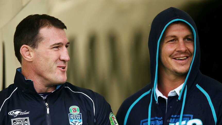 Paul Gallen (left) and Greg Bird look on