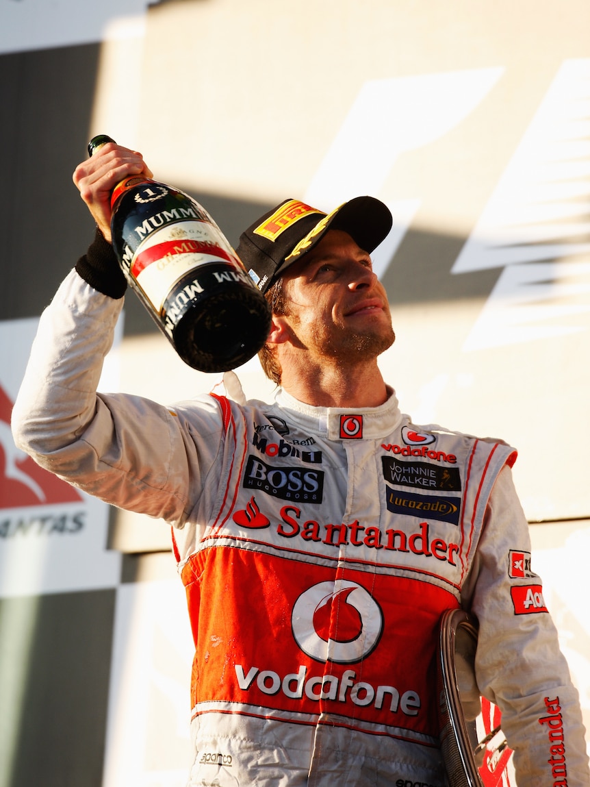 Jenson Button enjoys the taste of victory in Melbourne again.