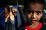 A young Sri Lankan Asylum seeker waits to be relocated on April 14, 2010 in Merak, Banten Province, Indonesia. (Getty Images:...