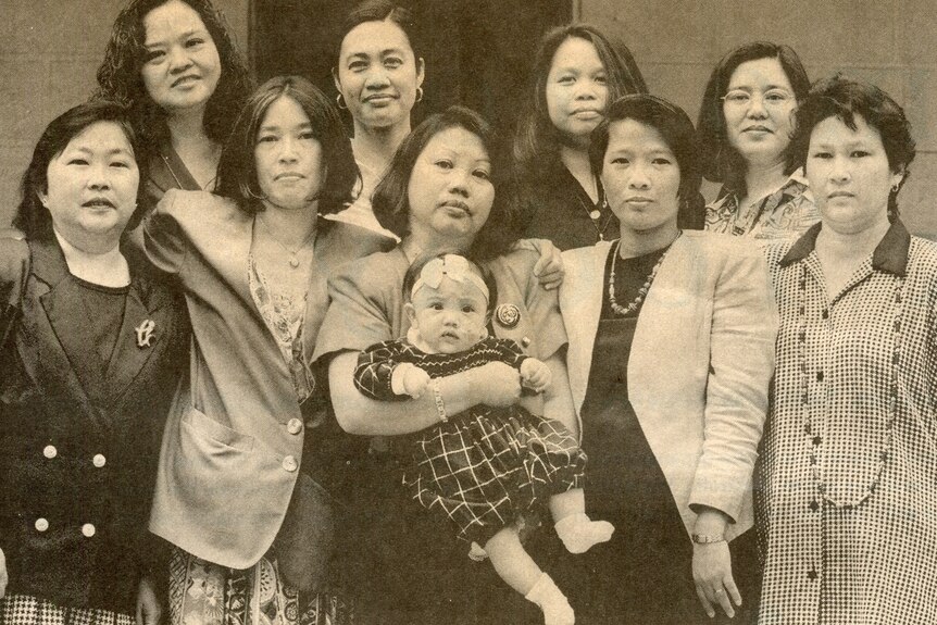 A newspaper clipping shows a black and white image of Filipina women in front of a courthouse.