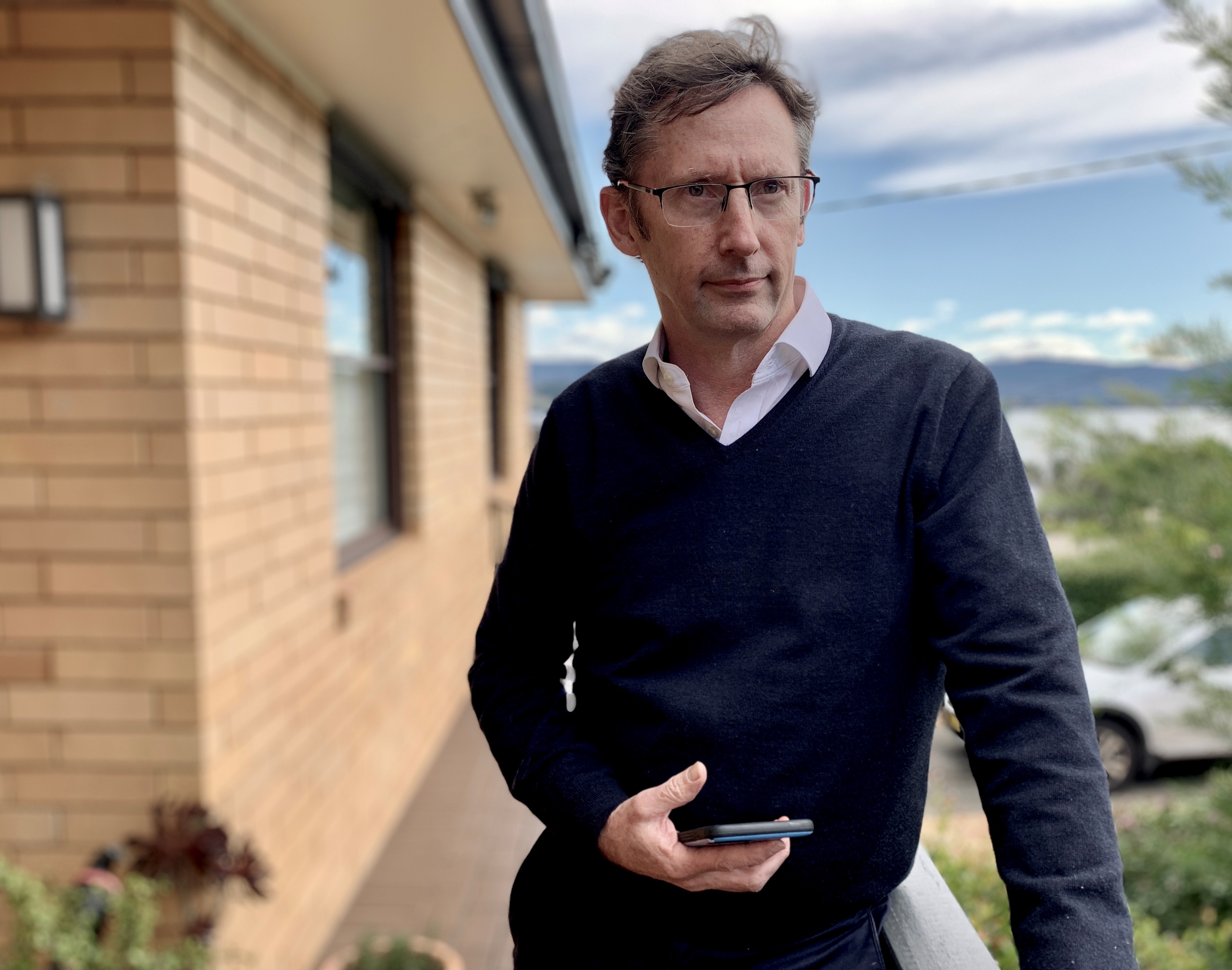 Stephen Jones outside his home in NSW. 