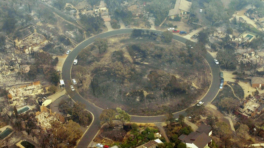 An aerial view of a fire-devastated Chauvel Circle in the Canberra suburb of Chapman in 2003.