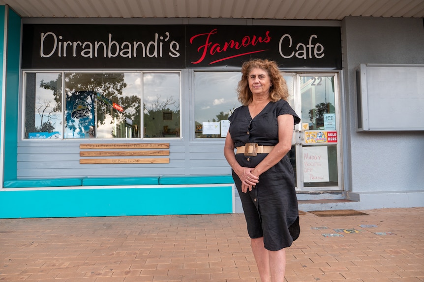 Tania Thomas stands out the front of the cafe she owns and runs in Dirranbandi, August 2023.