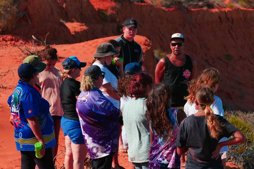 Yamatji girls pictured at Big Lagoon, Shark Bay with Darren "Capes" Capewell who is an indigenous tour operator.