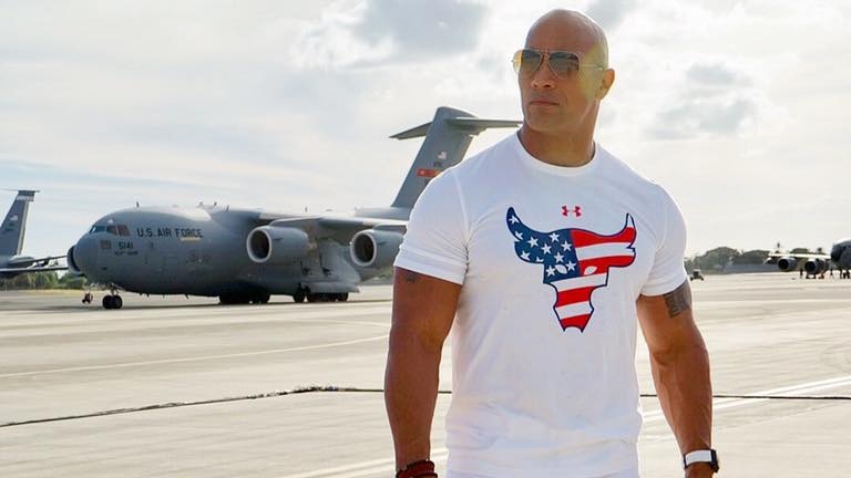 Dwayne "The Rock" Johnson with a US Air Force plane.