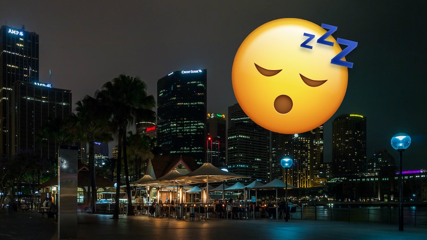 Sydney's skyline at night, with a sleeping emoji above it.