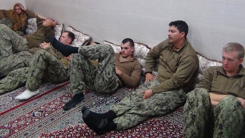American soldiers rest after release.
