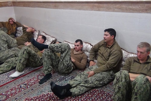 American soldiers rest after release.