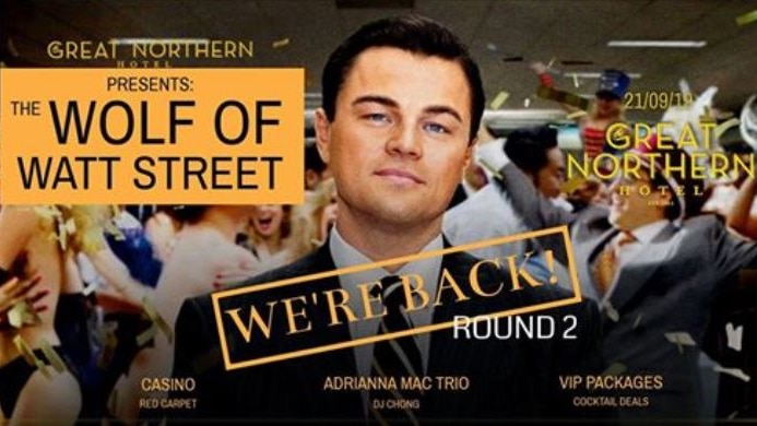 A poster with Leonardo di Caprio in a scene from The Wolf of Wall Street