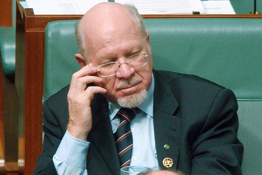 Dr Mal Washer listens during question time