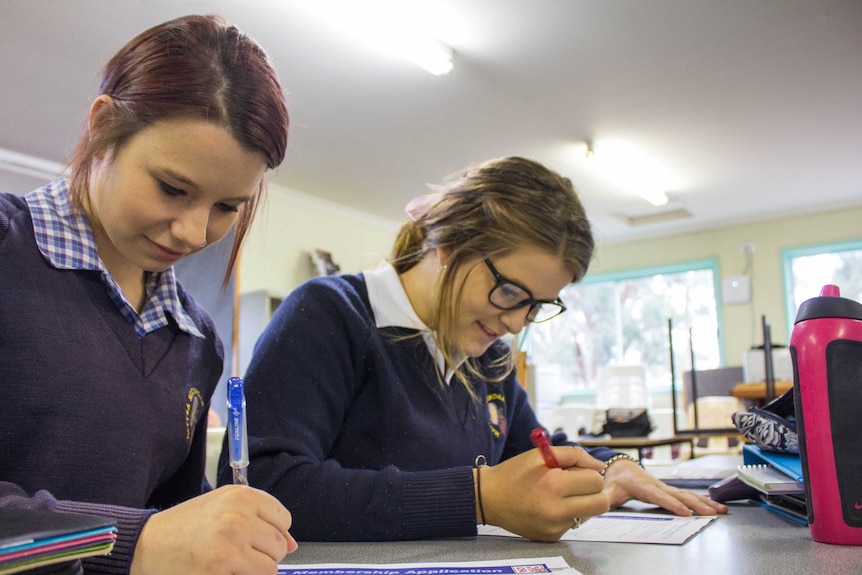 Kaitlin McClain and Natalie Edwards studying as part of the CFA youth crew subject at Maffra Secondary