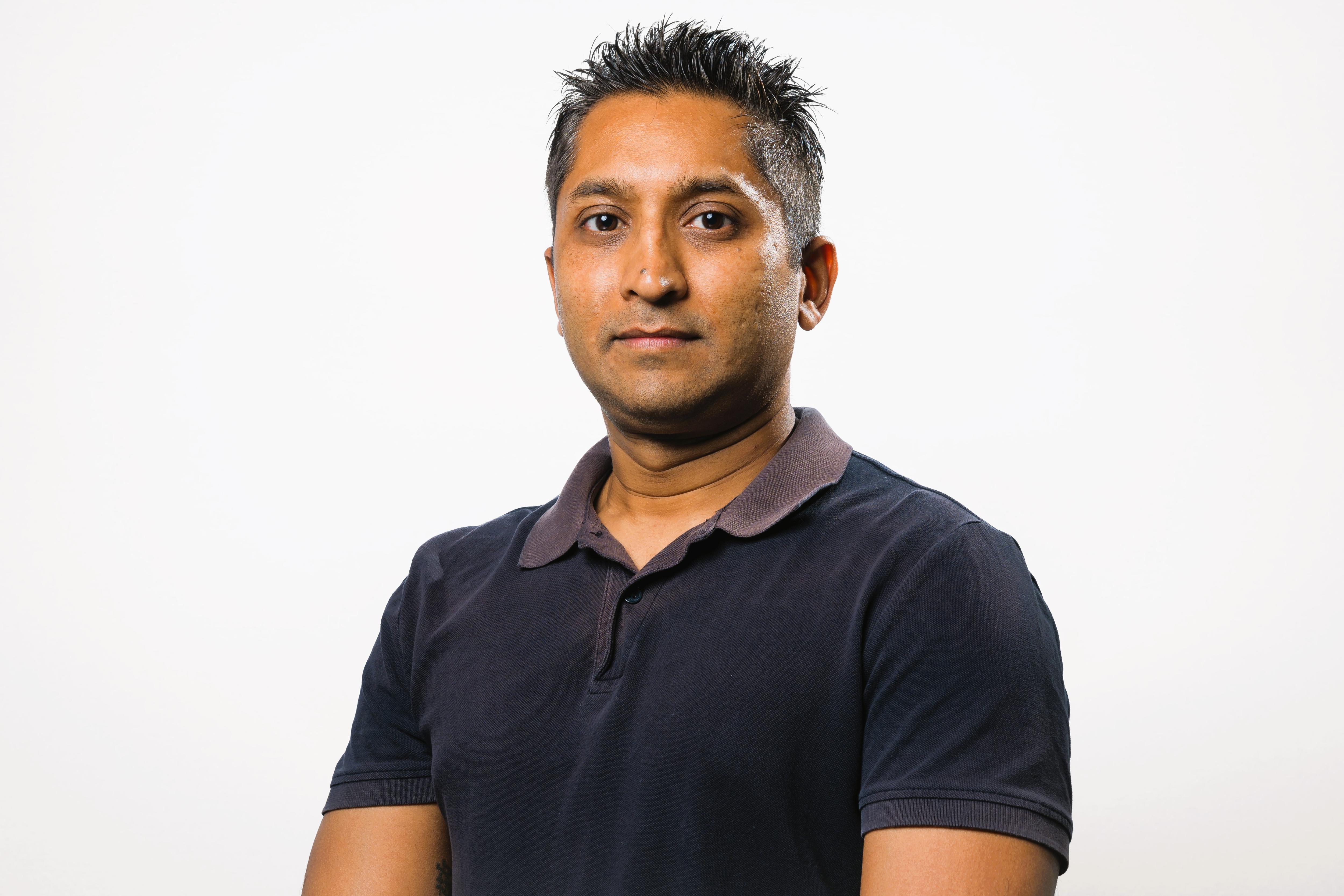 A portrait photo of a university lecturer