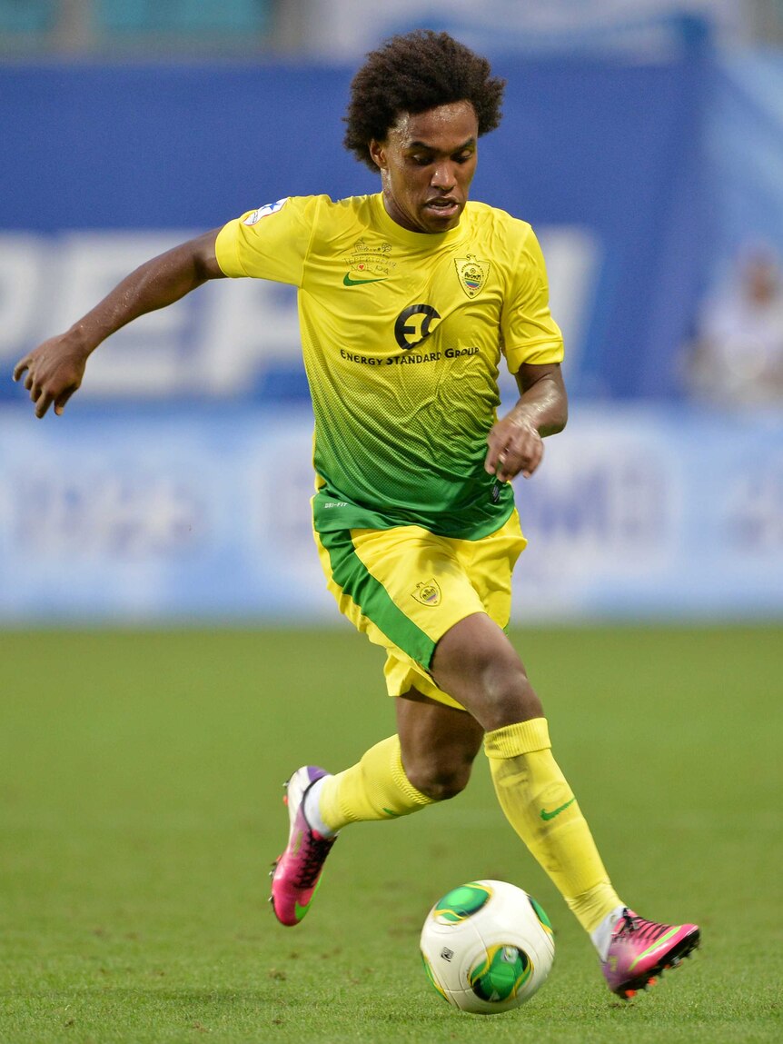 Willian plays the ball for Anzhi