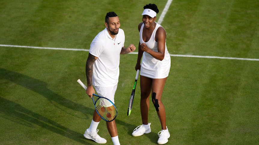 Nick Kyrgios and Venus Williams bump fists during their Wimbledon mixed doubles match.