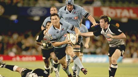 Mat Rogers in action for the Waratahs against the Sharks