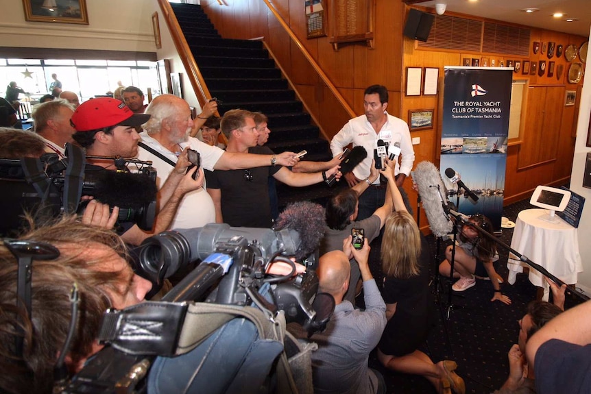 Mark Richards addresses media after protest hearing