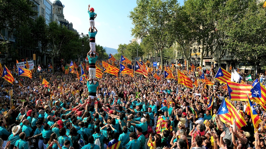 Supporters demonstrate in Barcelona in an unprecedented show of mass support for autonomy from Madrid.
